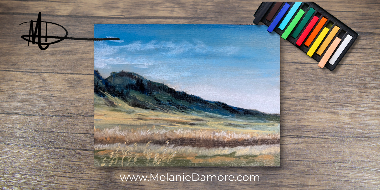 Art Class - Painting of a landscape with pastel colors on a wooden surface, featuring the artist's signature and website.